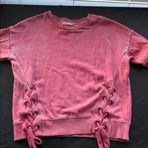 Long sleeved pink side tie sweater